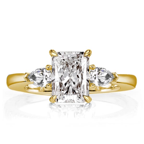 Golden Three Stone Radiant Cut Engagement Ring