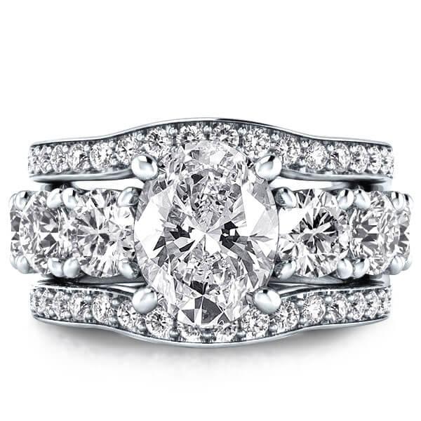 Seven Stone Oval 3PC Wedding Set (3.90 CT. TW.)