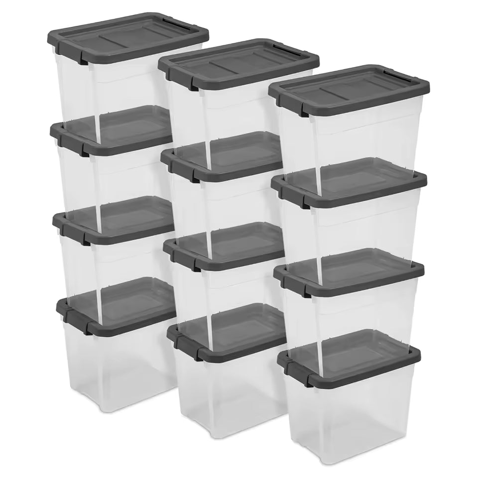 Stack of twelve clear plastic 30-quart storage bins with grey latching lids, organized in three rows for bulk home storage.