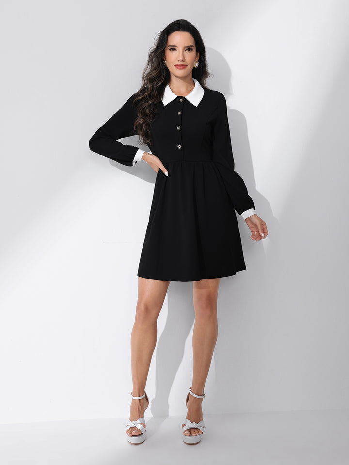 Woman wearing a black dress with a white collar against a white background