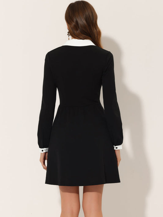 Black dress with long sleeves on a white background