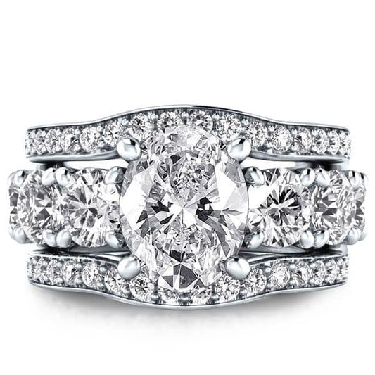 Seven Stone Oval 3PC Wedding Set (3.90 CT. TW.)