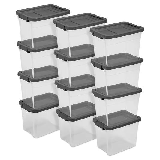 Stack of twelve clear plastic 30-quart storage bins with grey latching lids, organized in three rows for bulk home storage.