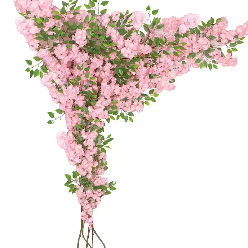 Pink artificial cherry blossom wall installation kit with natural rattan vines for wedding background and home decor.