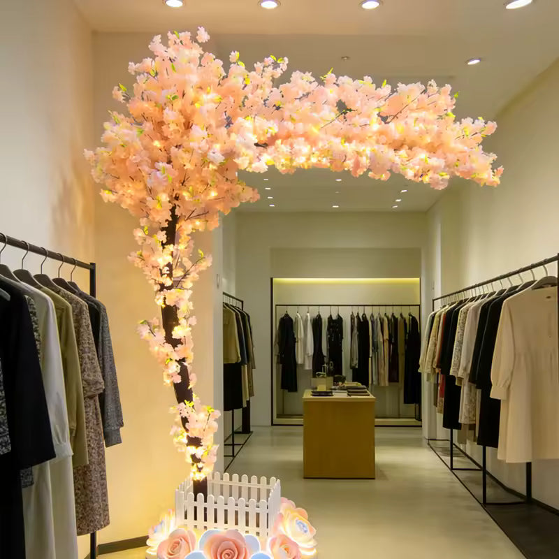 Premium silk artificial cherry blossom branches showing bendable metal wire inner core and detachable tight interface for DIY installation.