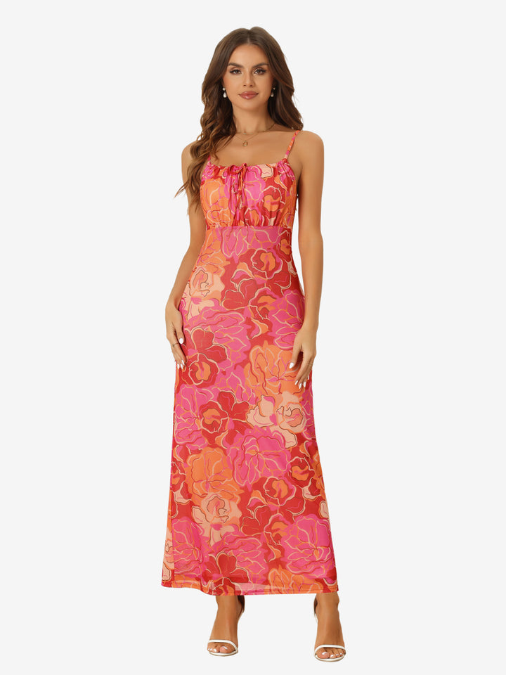 Woman wearing a pink floral dress on a white background