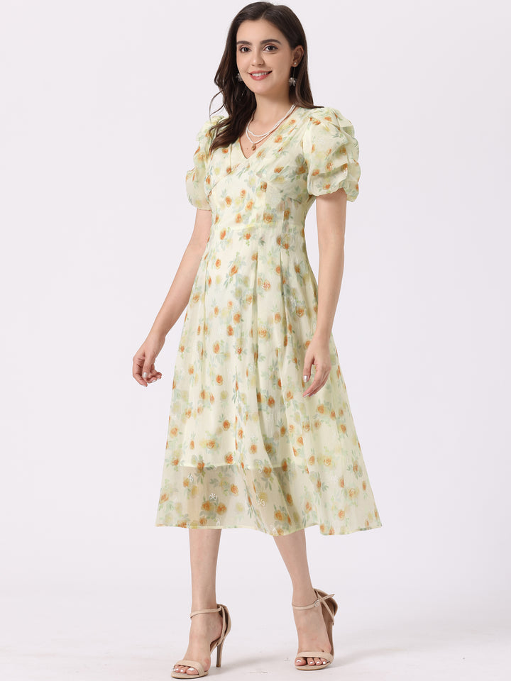 Woman wearing a floral dress on a white background