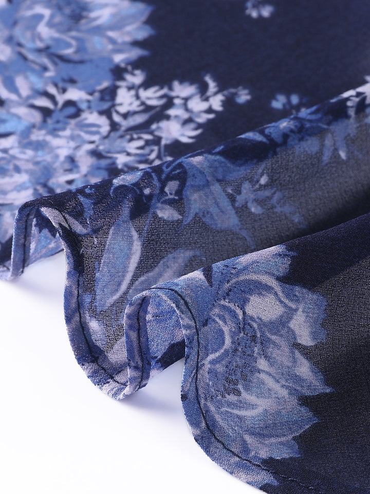 Close-up of blue floral fabric with a white background